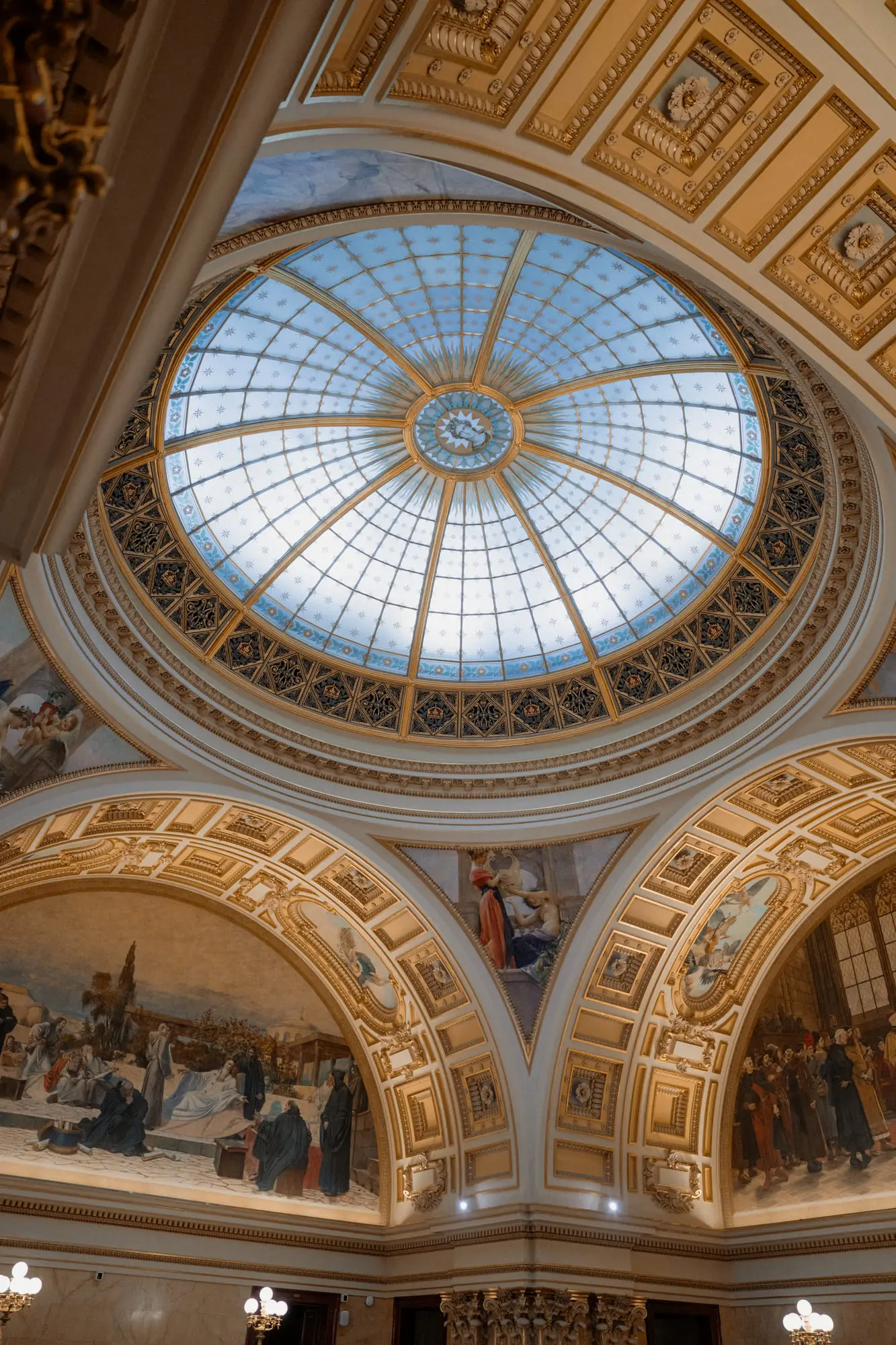 The stained-glass dome and painted lunettes of the National Museum's pantheon