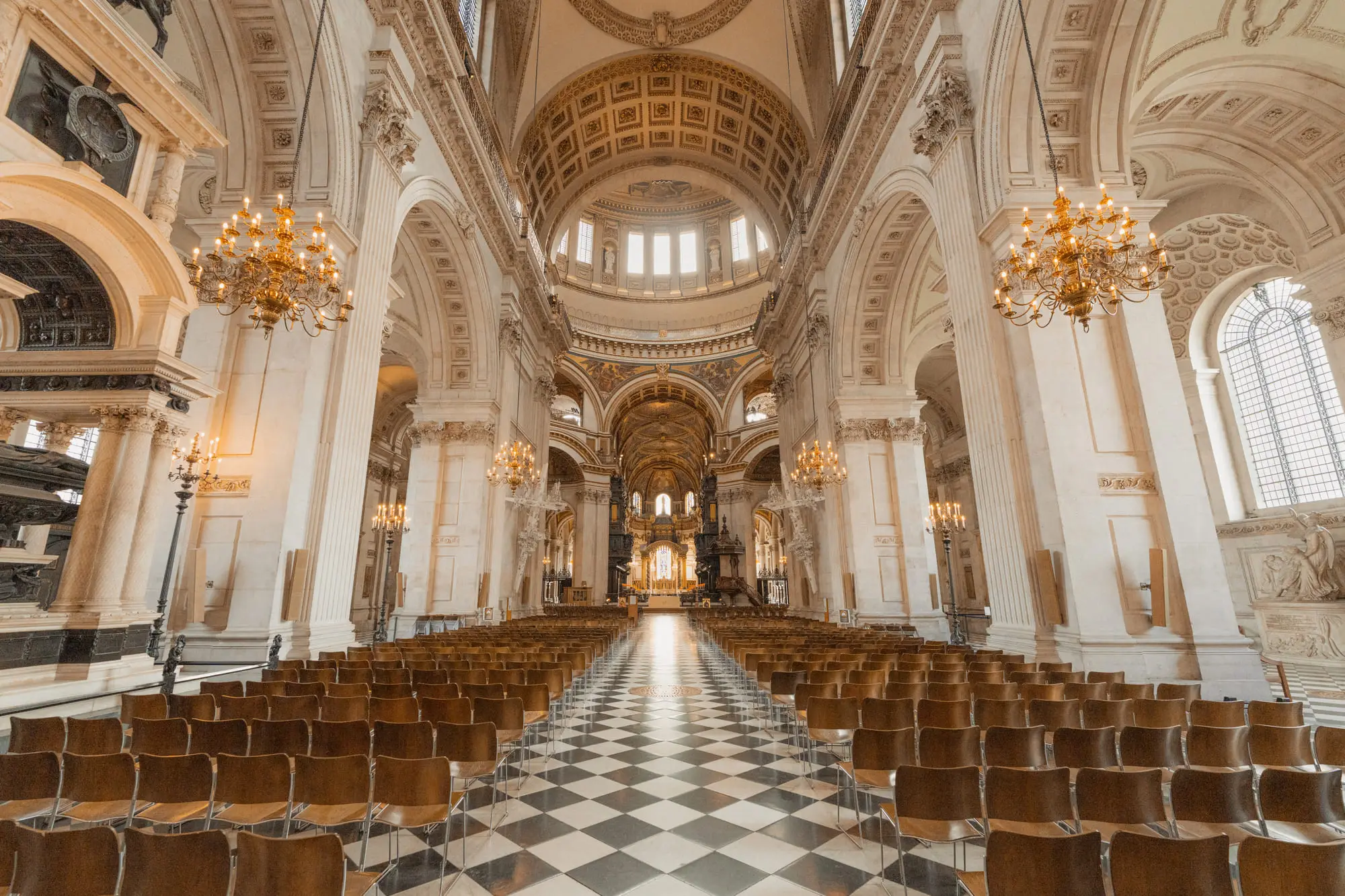 The nave of St Paul's Cathedral, chandeliers and a checkerboard floor