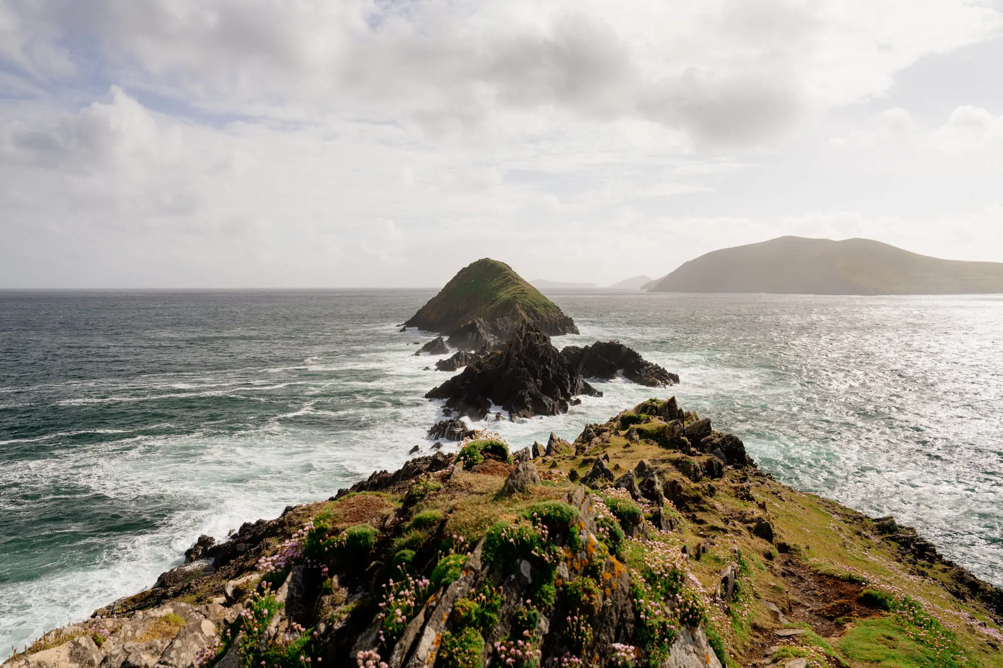 A sea stack and grassy ridge at Dunmore Head, Dingle